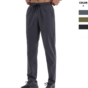 กางเกงวิ่งออกกำลังกายผู้ชายแบบแห้งเร็ว ยืดหยุ่นสูง สำหรับกิจกรรมกลางแจ้ง สวมใส่สบาย ระบายเหงื่อได้ดี และกันน้ำ - Product Image 1
