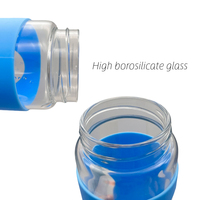 Bouteille d'eau potable en verre de 650ml 1000ml avec manchon en silicone Flacon à thé en verre de grande capacité avec logo personnalisé pour eau chaude