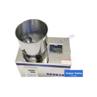 Machine de pesage et de remplissage semi-automatique de granulés de poudre 1-50g pour distributeur de grains de café pop-corn de noix