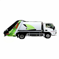 Camion poubelle à levage et compression
