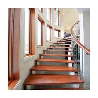 Escalier en bois massif avec marches en verre rondes / Escalier incurvé moderne en acier inoxydable