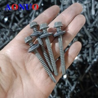 Vente directe usine C1022 Vis autoperceuses en acier au carbone avec revêtement Ruspert, tête hexagonale à bride, pour toiture, avec rondelle EPDM collée
