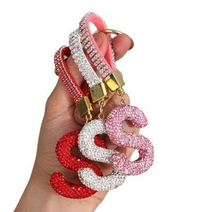 Porte-clés en métal haut de gamme avec lettres anglaises entièrement serties de diamants, pendentif décoratif pour femme, porte-clés de voiture, cadeau, jouet - Product Image 5