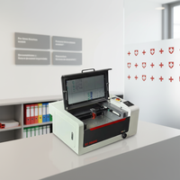 Machine de gravure et de découpe au laser CO2 fabriquée en Chine pour le caoutchouc, le verre, la pierre, le bois, le MDF, le papier - Haute précision, refroidissement par eau, prise en charge DXF