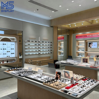 Vitrine d'exposition personnalisée pour magasin d'optique, présentoir mural en bois rétroéclairé par LED pour lunettes, étagère de vente au détail pour lunettes de soleil, pour magasin d'optique, centre commercial, kiosque