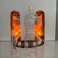 Machine de soufflage semi-automatique pour bouteilles en PET avec système de chauffage stable pour la production de bouteilles d'eau et de boissons