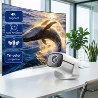 Mini projecteur portable avec base rotative à 180°, résolution native 1280*720 HD, système Android, WiFi, Bluetooth, décodage 4K, télécommande et processeur quadricœur