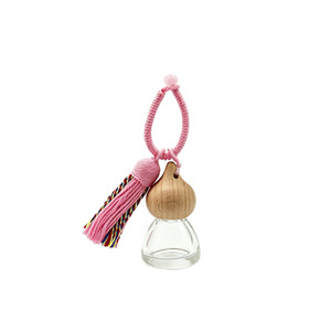 Difusor de aroma de cristal con forma de calabaza, colgante con borla, botella vacía para fragancia, adorno aromático para coche y mochila, venta al por mayor - Product Image 1