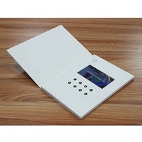 Nouveauté : brochure vidéo multifonctionnelle avec écran LCD de 7 pouces, contrôle magnétique, batterie au lithium, marque blanche, cadeau
