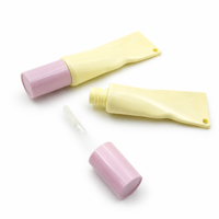 Tube de brillant à lèvres vide en forme de macaron jaune et rose avec trou pour porte-clés, flacon de gloss à lèvres compressible pour emballage de maquillage