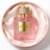Flacon de parfum en verre rose cylindrique moderne de 50 ml et 100 ml, avec couvercle à motif cuir, logo personnalisé OEM disponible