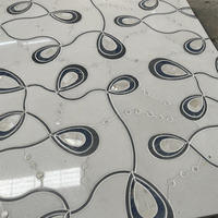 Mosaïque en pierre de design populaire, découpe au jet d'eau, motif floral, mosaïque en marbre bleu et blanc pour sol et mur de salle de bain