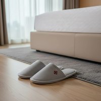 Chaussons jetables en velours écologiques, personnalisables avec logo, adaptés aux chambres d'hôtel