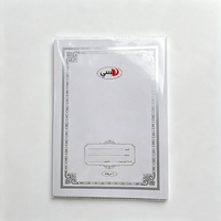 Cahier d'exercices arabe personnalisé 215x154mm avec reliure piquée à cheval et couverture transparente, pages quadrillées, impression OEM en gros