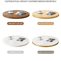 Table basse ronde moderne de luxe en faux marbre à double niveau avec structure en métal noir pour salon, café, appartement
