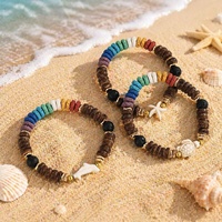 Bracelet élastique bohème avec breloques tortue, étoile de mer et dauphin en turquoise, perles de coquillage de plage et pierres volcaniques