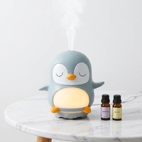 Diffuseur d'huiles essentielles ultrasonique électrique en forme de pingouin, style enfantin, avec 7 LED, en vente