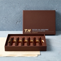 Boîte rigide personnalisée avec couvercle en chocolat pour 6 flacons de peptides, en carton éponge, impression offset, logo estampé à chaud en feuille d'or