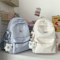 Nouveau Sac à Dos Unisexe Élégant et Respirant en Nylon Couleur Unie Grande Capacité avec Bretelles à Coussin d'Air pour Filles et Femmes du Collège et Lycée