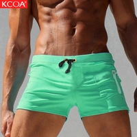 En Stock blanc séchage rapide léger élastique maillot de bain avec poche zippée hommes athlétique entraînement Gym court pour hommes