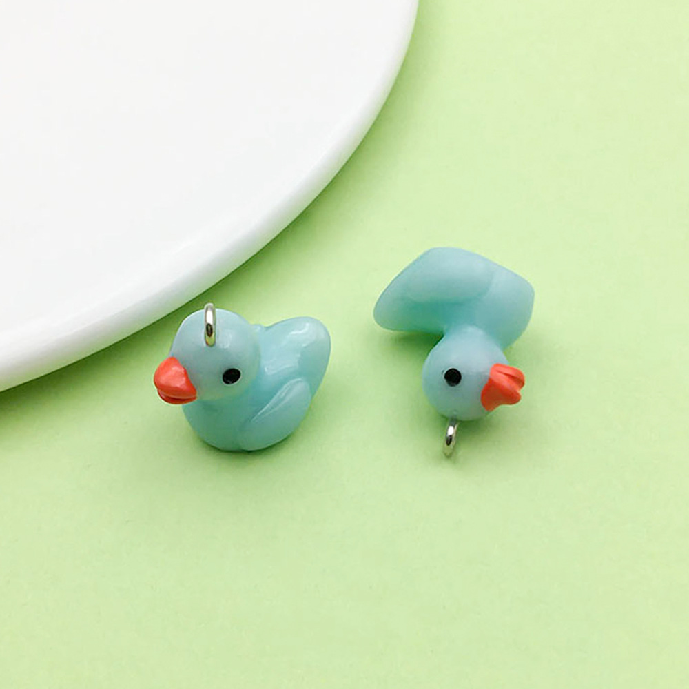 Un patito de resina azul lago, 17*19 mm, 1,9 g, 17216 g.