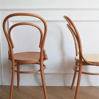 Chaise de salle à manger de style français en bois massif haut de gamme pour usage commercial, siège en rotin rembourré, design nordique européen