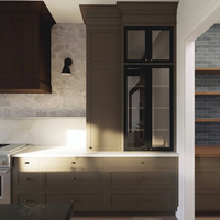 Armoires de cuisine Shaker en noyer foncé du Vermont avec vitrines et îlot central en pierre pour projets d'aménagement intérieur haut de gamme