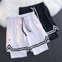 Shorts de basketball respirants en maille double couche pour adolescents, style américain, au-dessus du genou, pour la course et l'entraînement physique (vente en gros)