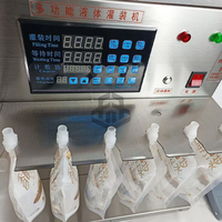 Machine de remplissage de liquides à six têtes semi-automatique pour boissons, vin, boissons gazeuses, jus, lait, liqueur, eau, avec buse debout