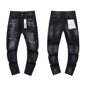 Nueva colección de la marca de moda urbana: jeans AMI personalizados para hombre, con diseño rasgado, patchwork moderno, bordados, elásticos y de pierna estrecha. - Product Image 4