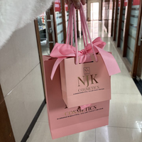 Sacs cadeaux élégants personnalisables avec logo en aluminium Sac à provisions en papier de couleur pour l'artisanat de bijoux et de vêtements avec nœuds à poignée en ruban