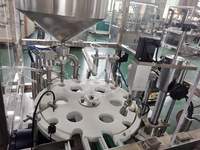 Machine de remplissage automatique de bouteilles de déodorant de bâton de tube de liquide de corps de rouleau