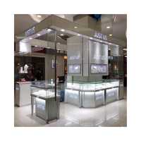 Vitrine de présentation de bijoux robuste et étanche avec éclairage LED pour parfums et électronique, design carré pour musées