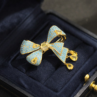 Broche de luxe XILIANGFEIZI avec nœud bleu en zircon et pompon, accessoires exquis et haut de gamme pour femmes