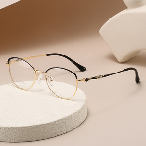 กรอบแว่นตาโลหะทรงวงรีเต็มกรอบ น้ำหนักเบา สำหรับทุกเพศ สีทองดำ สไตล์ Pure Vision - Product Image 1