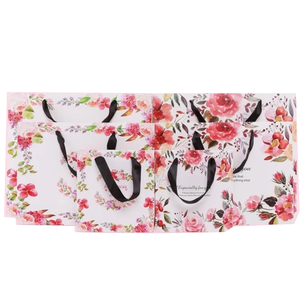 Bolsas de papel blanco personalizables de alta calidad laminadas reciclables con hermoso diseño personalizado - Product Image 1