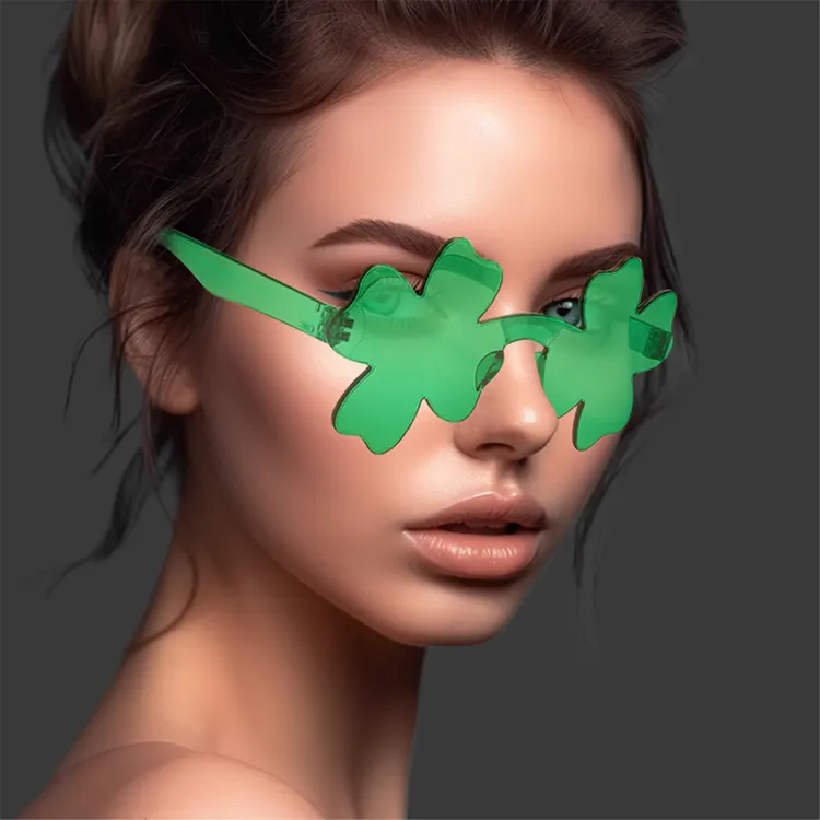 Vente en gros de lunettes sans monture en forme de trèfle Lunettes de soleil une pièce fantaisie fleur translucide pour la Saint-Patrick