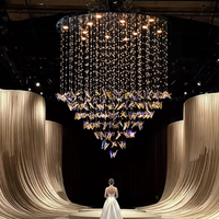 Nouveau lustre moderne haut de gamme en cristal, forme papillon, structure métallique, luminaire suspendu LED pour la décoration de mariages, banquets et événements