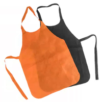 Vente en gros de bavoir de restaurant écologique bon marché enfants tabliers jetables non tissés pour la peinture logo personnalisé