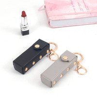 Étui à rouge à lèvres imprimé léopard en PU, porte-clés portable, pochette pour baume à lèvres avec porte-clés en métal, étui de rangement cosmétique pour femmes