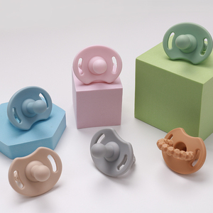 Venta al por mayor cara sonriente forma seguridad suave grado alimenticio silicona bebé chupete de pecho como chupete - Product Image 3