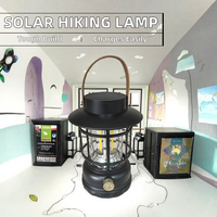 Lanterne de camping solaire LED vintage, rechargeable par solaire et USB-C, intensité réglable, style rétro, en plastique, avec poignée en cuir, pour tente