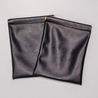 Sac de voyage portable en cuir PU noir durable BaiShun pour cosmétiques et bijoux, petite trousse de toilette réutilisable avec fermeture magnétique en métal