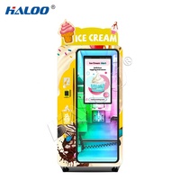 Distributeur automatique Haloo 24h/24 de yaourts et glaces molles avec système de paiement par pièces, code QR et jetons
