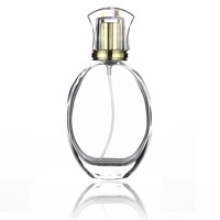 Flacon de parfum en verre haute transparence avec pulvérisateur à pompe, design robuste et lisse, affiche parfaitement la couleur originale du parfum