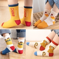 Chaussettes en tricot mi-hautes pour l'automne et l'hiver, design décontracté pour bébé, motif de dessin animé, pour les garçons et les filles