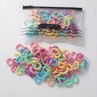 100 pièces Mini bébé cheveux cravates enfant en bas âge cheveux cravates pour filles et enfants multicolore petits bandeaux sans couture élastiques élastiques pour queue de cheval