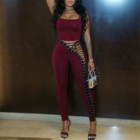 Pantalon moulant sexy pour femme avec découpes latérales et œillets, style bandage, pour les filles branchées