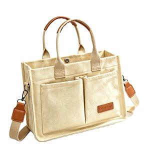 Sac fourre-tout en toile écologique et durable avec deux poches avant, logo personnalisé, grande capacité, sac à bandoulière en coton pour les trajets quotidiens - Product Image 1