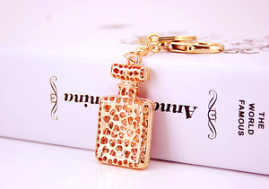 Botella de <span class=keywords><strong>Perfume</strong></span> con diamantes de imitación para hombre y mujer, llavero de aleación, accesorios, colgante, llavero, dijes - Product Image 6